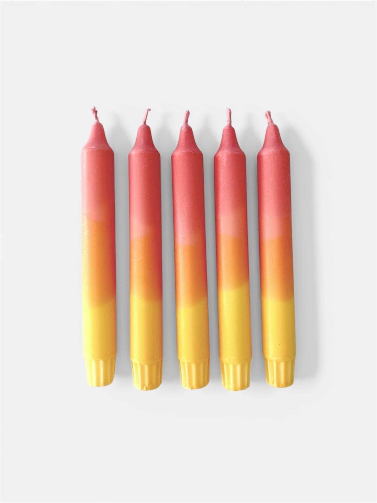 Colourful Hand Dipped Yellow & Pink punch Dinner Candles - The Mercantile London