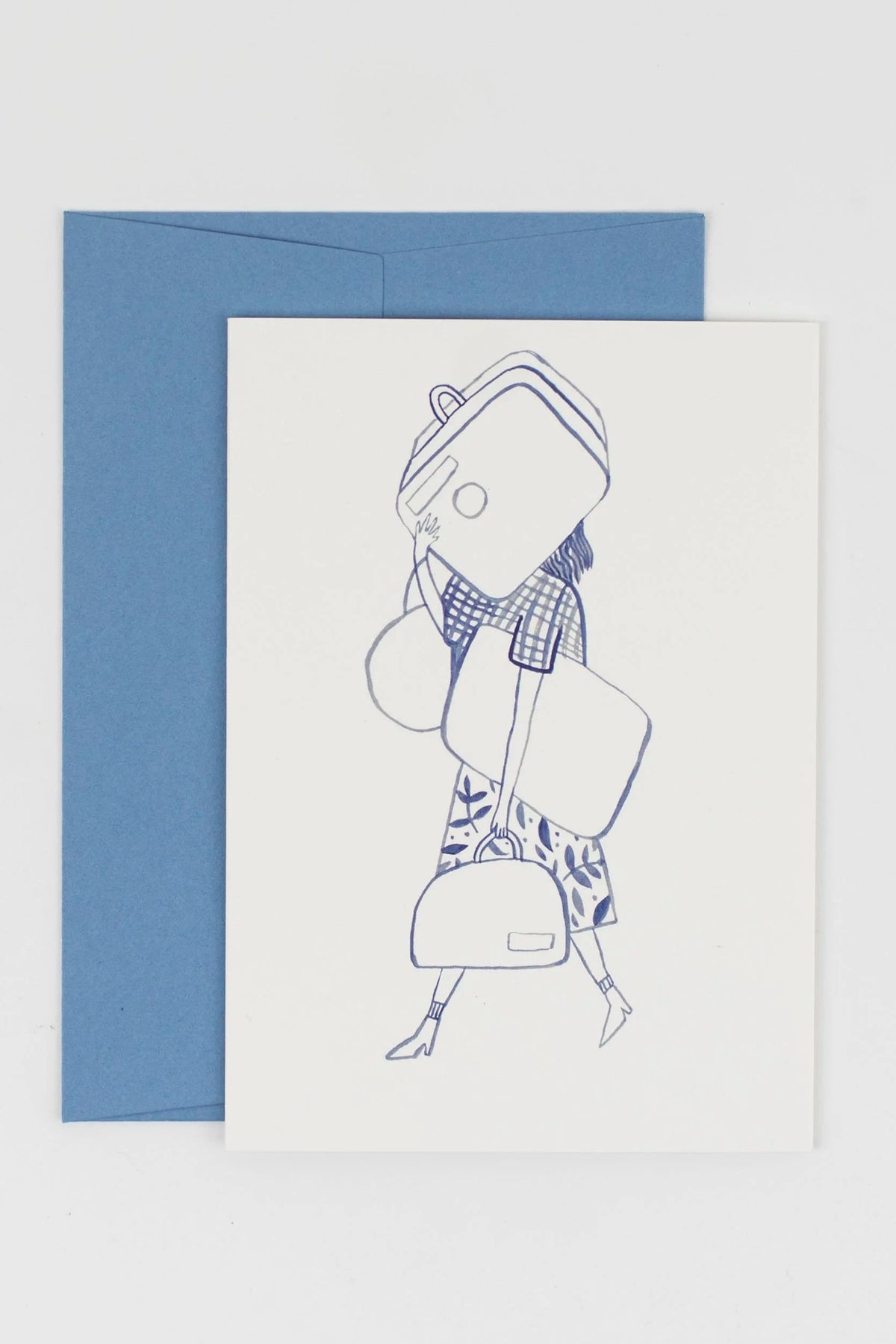 Greeting card with a blue envelope featuring a line drawing of a person wearing a hat and scarf on a light gray background.