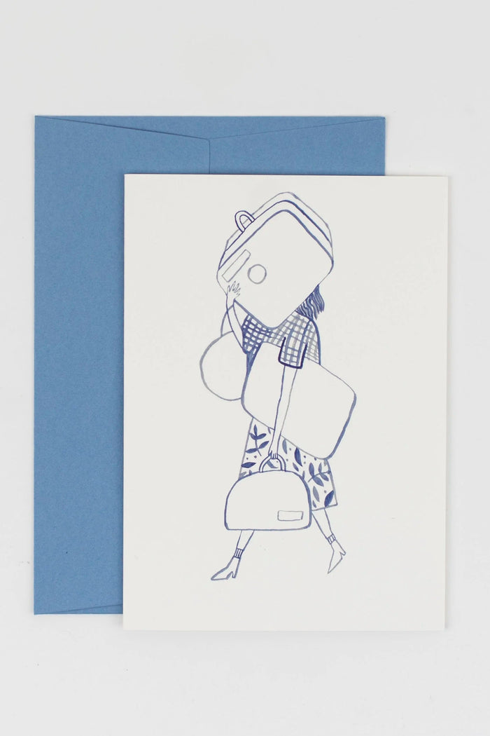 Greeting card with a blue envelope featuring a line drawing of a person wearing a hat and scarf on a light gray background.