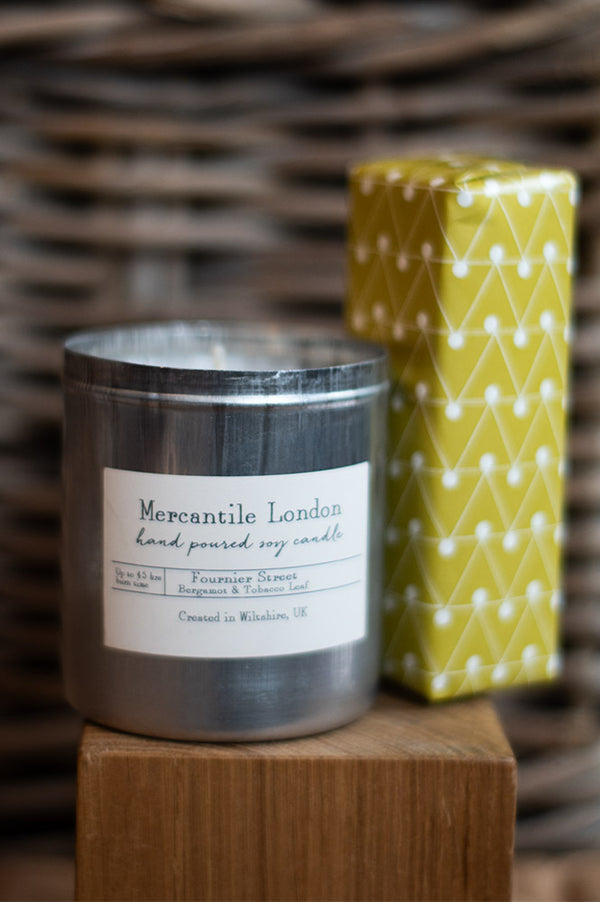 tobacco mercantile and Whiskey 11.5 oz Our 7.2 oz standard soy candle is hand poured into apothecary inspired amber jars in our Los Angeles Mercantile London Fournier Street Bergamot