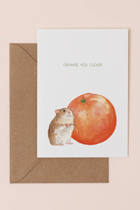 Greeting card with a hamster and orange illustration and 'Orange, you clever' text on a beige background.
