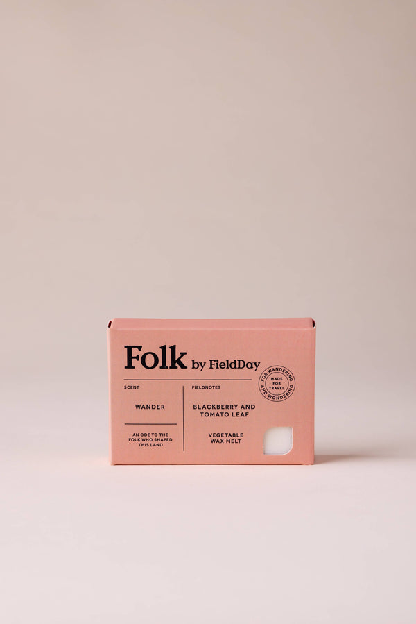 Pink wax melt packaging with 'Folk by Field Day' branding on a beige background