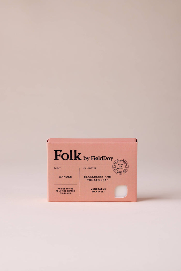 Pink wax melt packaging with 'Folk by Field Day' branding on a beige background