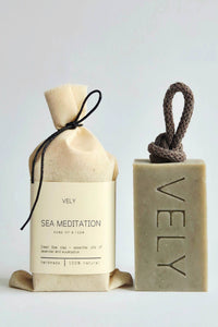 Two VELY soap products on a light gray background