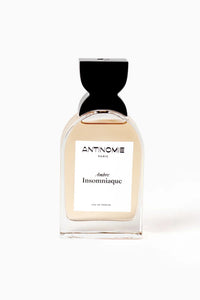 Perfume bottle labeled 'Antinomie' on a white background