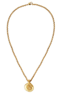 Gold necklace with a round pendant on a white background