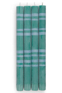 Set of five green candles with white stripes on a white background