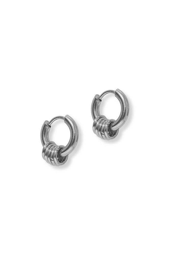Pair of silver hoop earrings on a white background