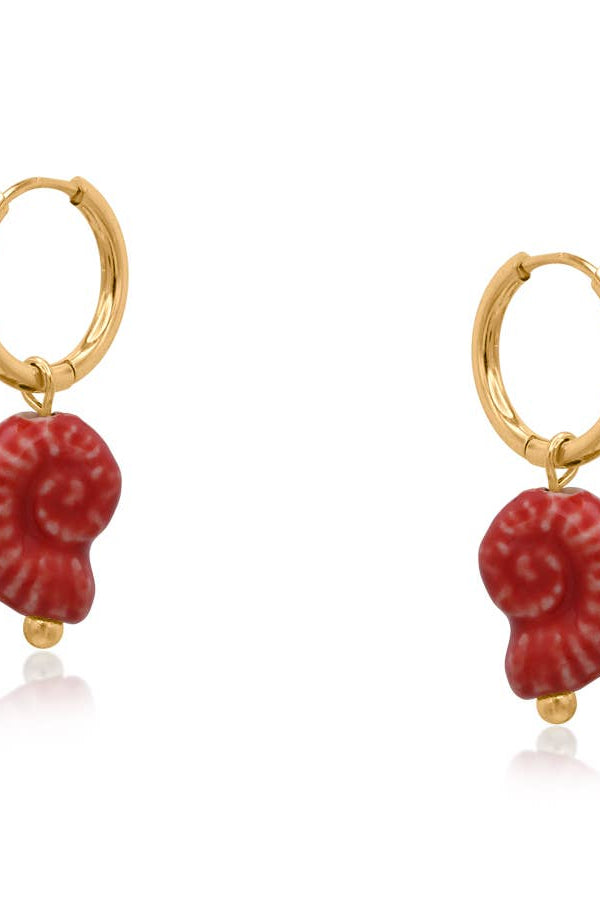 Gold hoop earrings with red amethyst stones on a white background