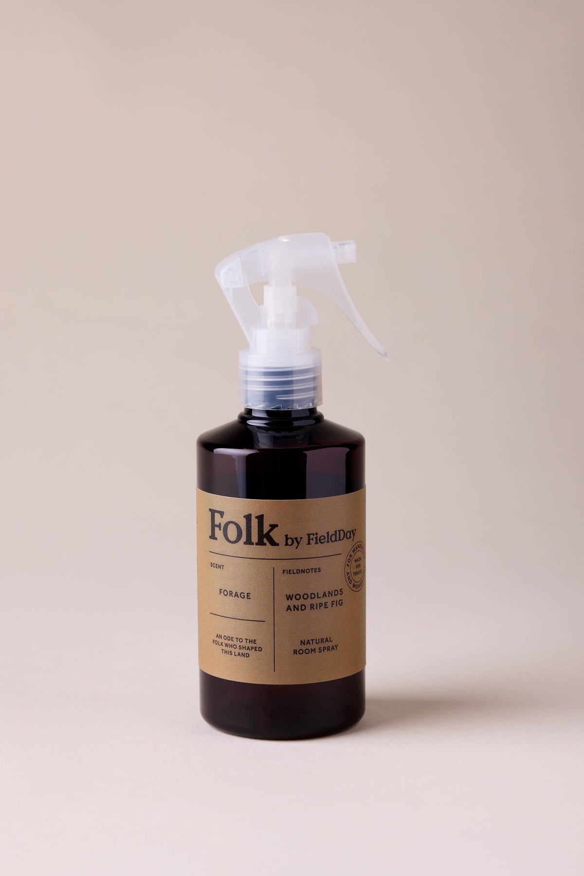 Folk by Field & Co. bottle with spray nozzle on a beige background