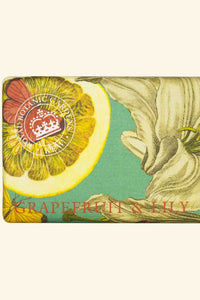 Soap bar with grapefruit and lily design on a green background