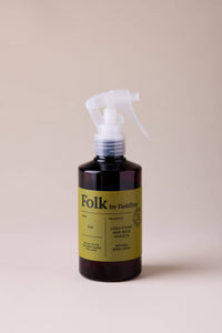 Folk by Field Day spray bottle on a beige background