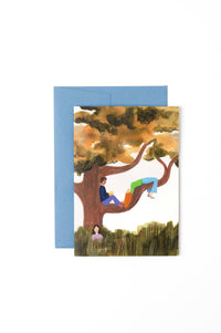 Greeting card with illustration of people sitting in a tree, blue envelope