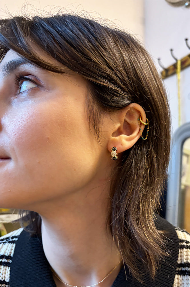 White Enamel Daisy Chain Huggie Hoop In Black & White - The Mercantile London