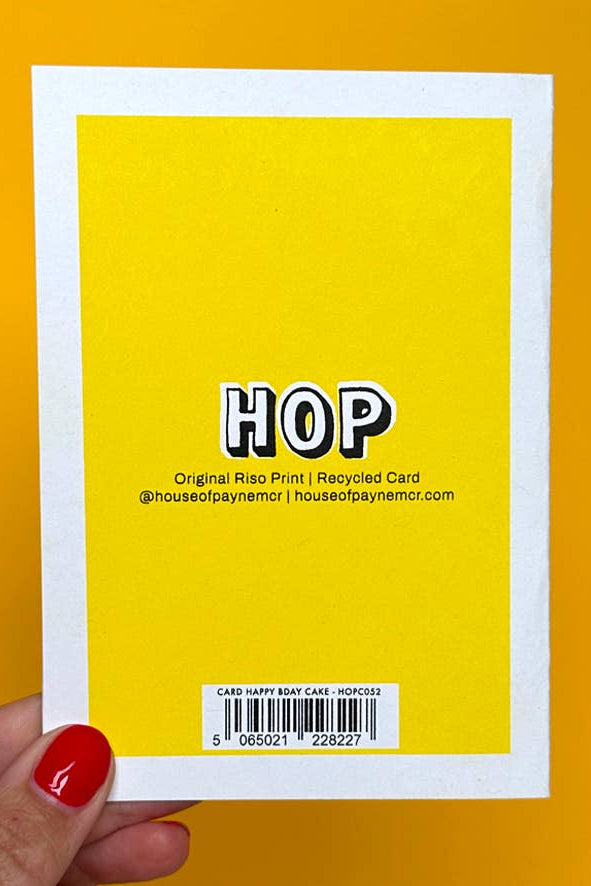 Yellow card with 'HOP' text held against an orange background