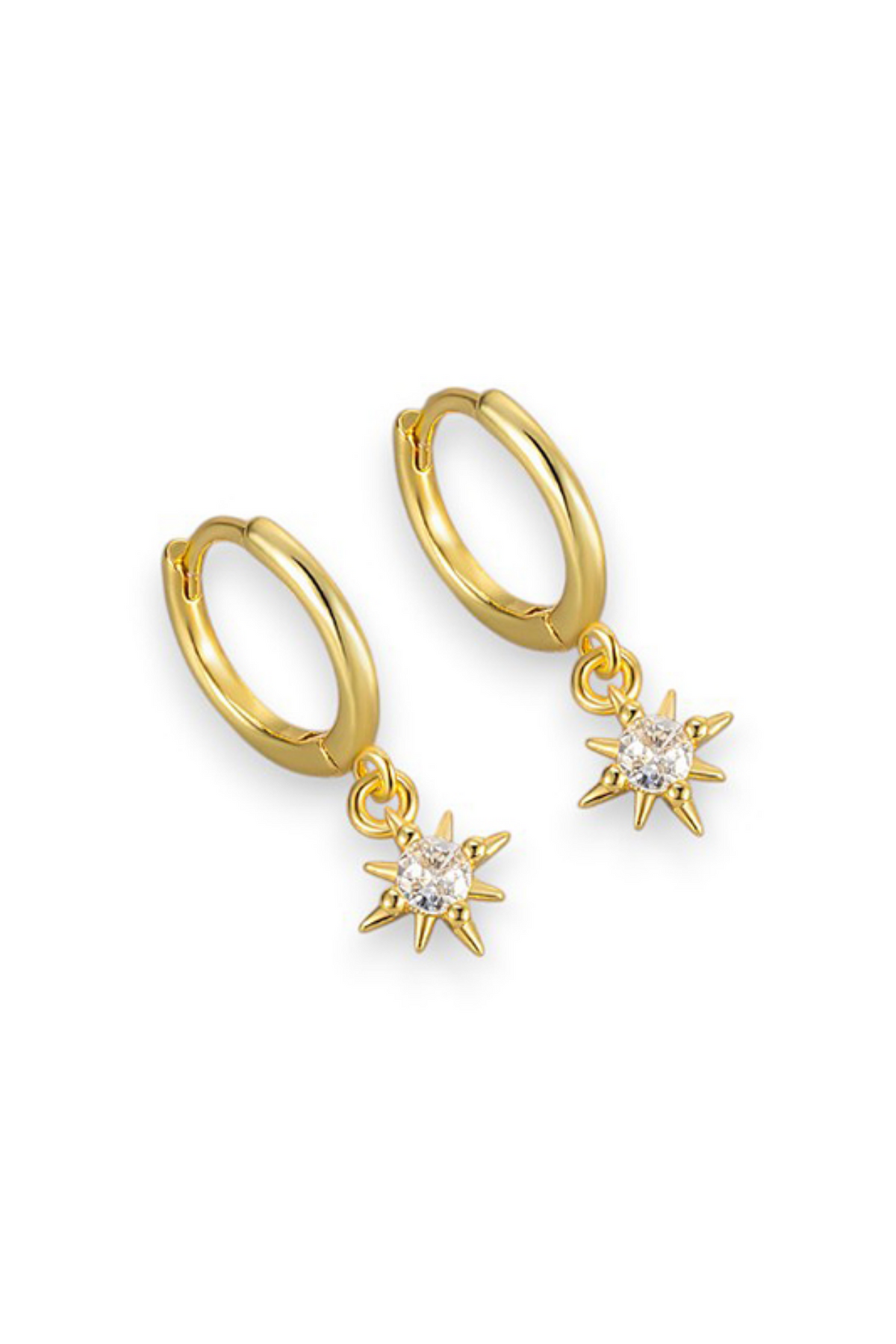 A pair of gold huggie hoop earrings with dangling star-shaped charms set with clear gemstones, shown on a plain white background.