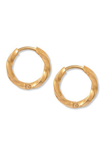 Gold hoop earrings on a white background