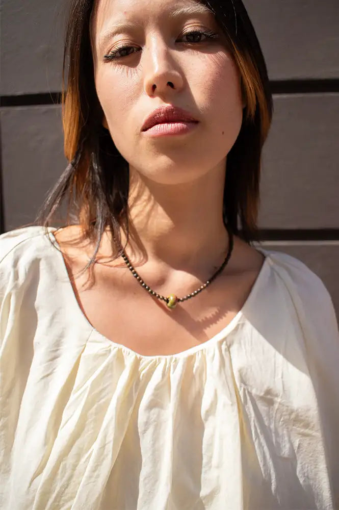 Palm Of Feronia Bronzite Gemstone Movement Necklace