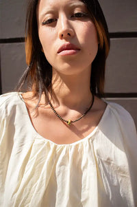 Palm Of Feronia Bronzite Gemstone Movement Necklace