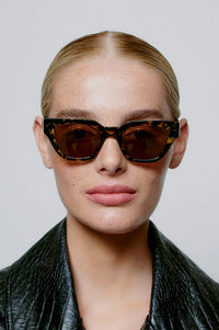 A Kjaerbede Kaws Black/Yellow Tortoise Sunglasses - The Mercantile London