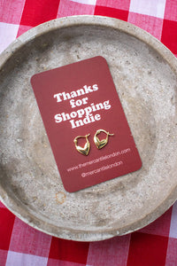 White Heart Gold Huggie Earrings