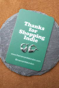 White Heart Silver Huggie Earrings