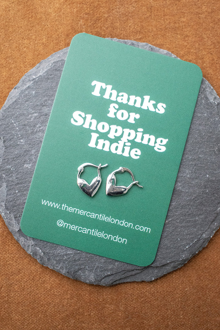 White Heart Silver Huggie Earrings