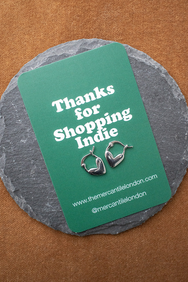 White Heart Silver Huggie Earrings