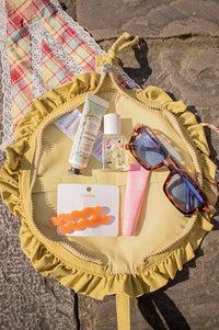 Damson Madder Celery Ruffle Half Moon Makeup Bag - The Mercantile London