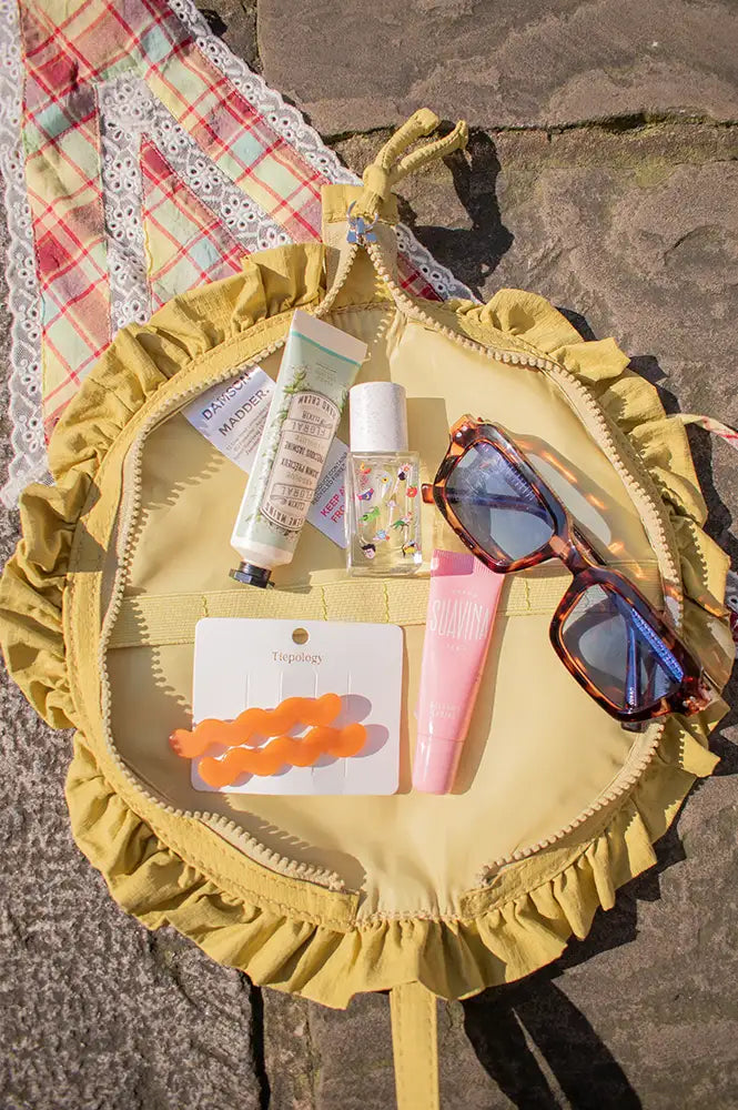 Damson Madder Celery Ruffle Half Moon Makeup Bag - The Mercantile London