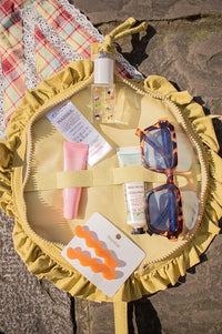 Damson Madder Celery Ruffle Half Moon Makeup Bag - The Mercantile London