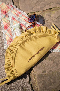 Damson Madder Celery Ruffle Half Moon Makeup Bag - The Mercantile London