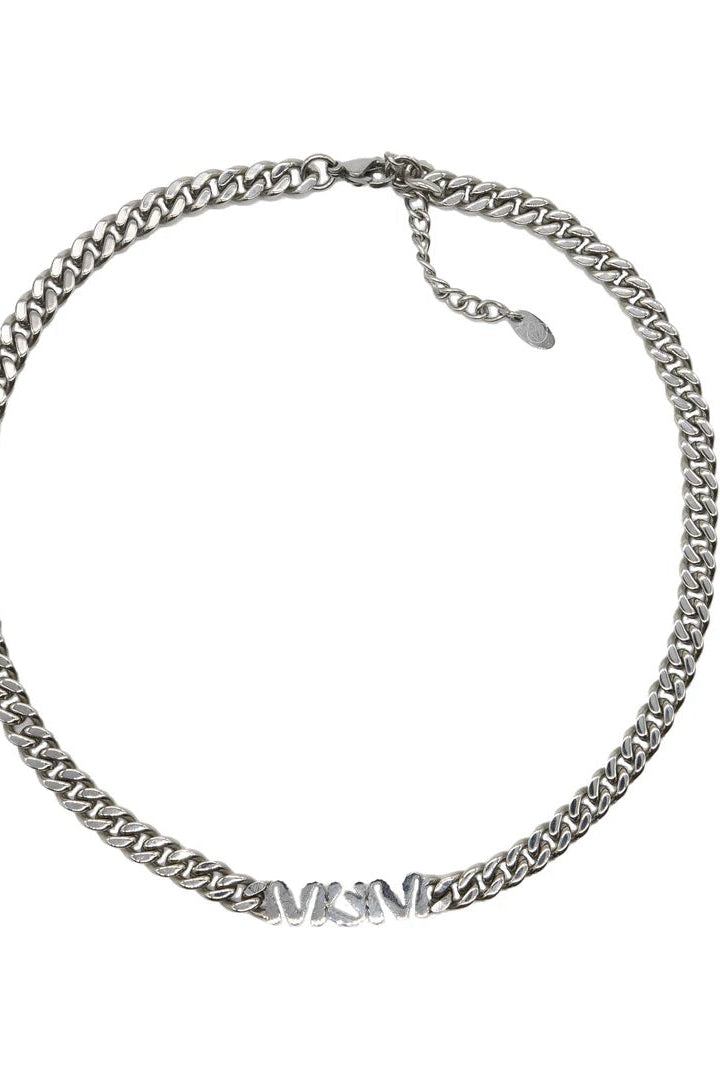 Silver chain necklace on a white background