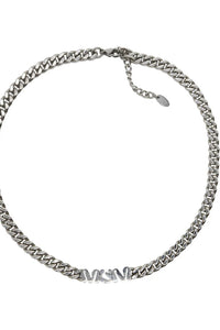 Silver chain necklace on a white background