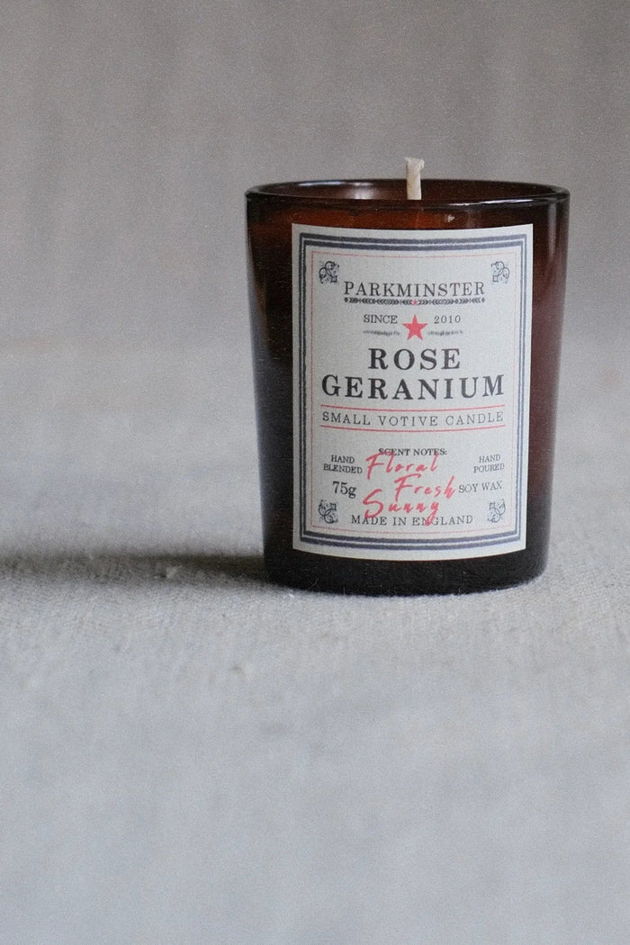 Candle with a label on a gray background