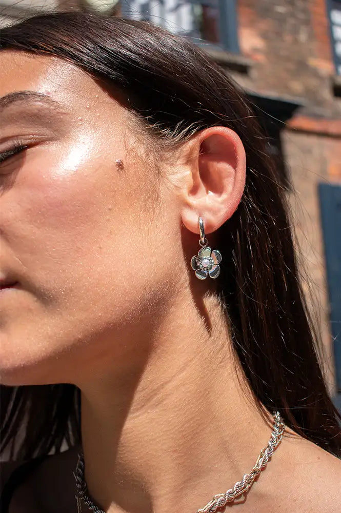 White Huggie Hoop Silver Flower Drop Earrings