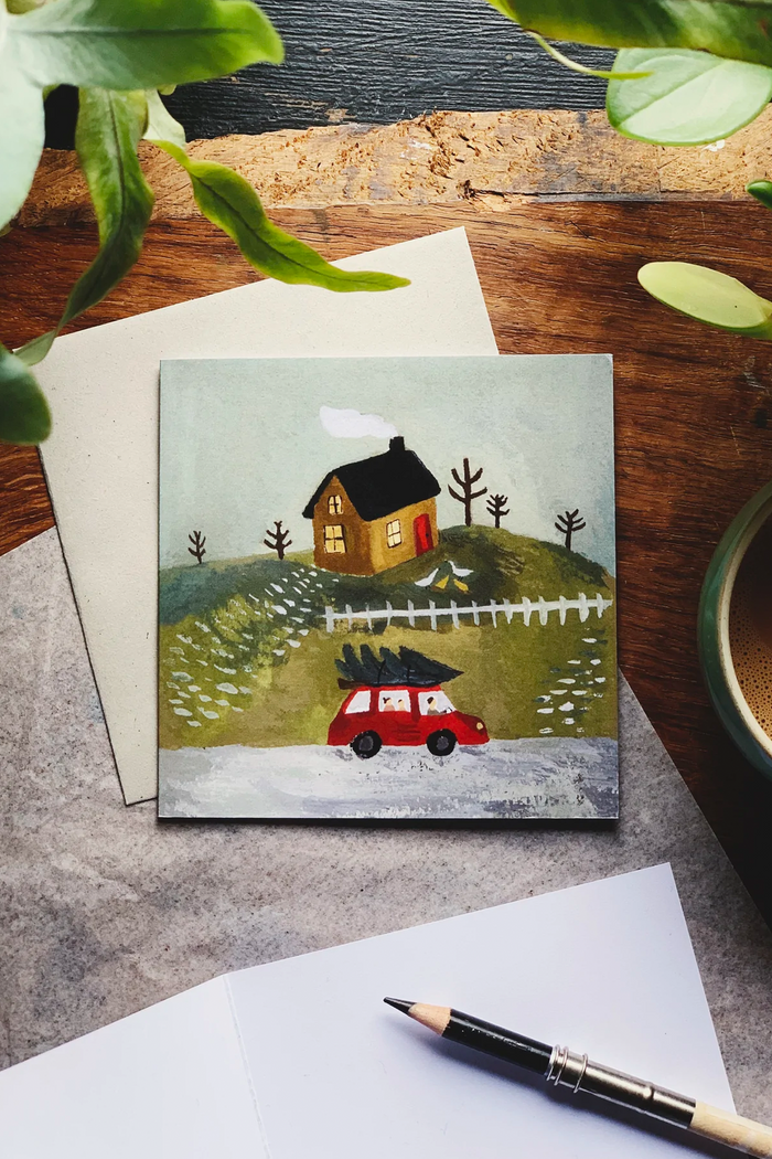 Gemma Koomen Bringing Home the Tree Card - The Mercantile London